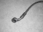 Klikněte pro detailní foto č. 4 - Brzdová hadice k přední brzdové pumpě